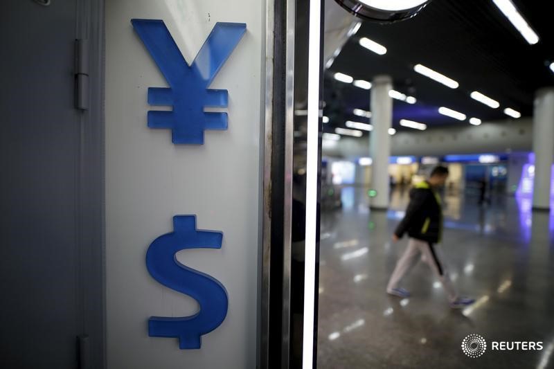 Asia FX sinks, yuan near 1-yr low after rate cut misses expectations